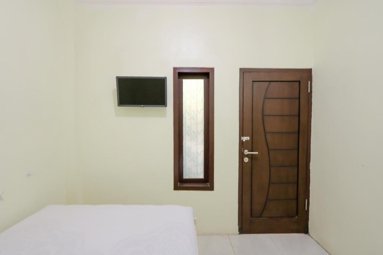 Zulfina Homestay Syariah Mitra Reddoorz بانيووانجى المظهر الخارجي الصورة